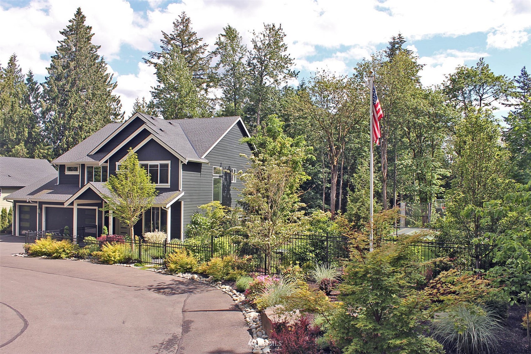 17720 190th Avenue Southeast Renton, WA 98058 - Photo 14 of 40 a front view of a house with garden