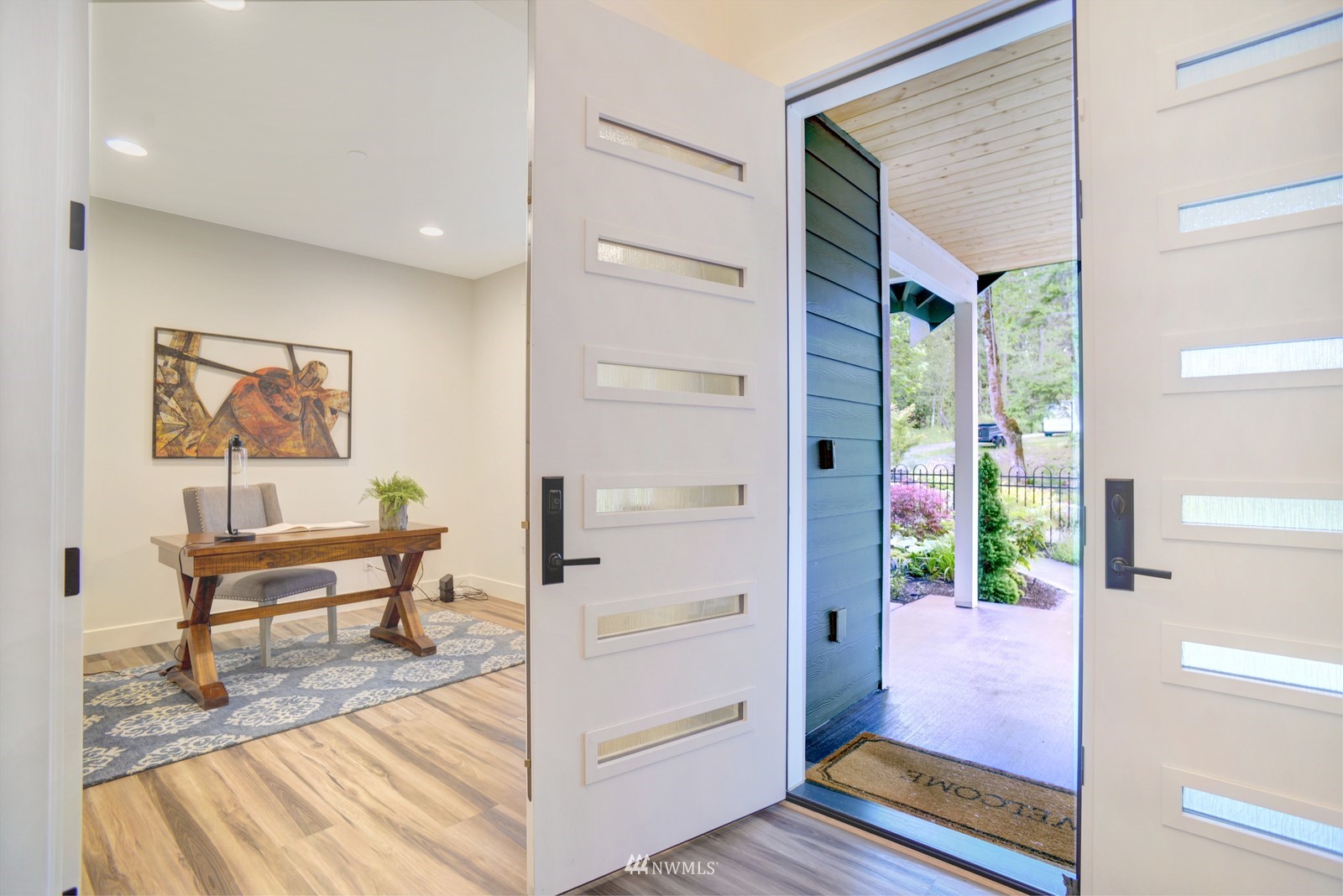 17720 190th Avenue Southeast Renton, WA 98058 - Photo 18 of 40 a view of a hallway with wooden floor and furniture
