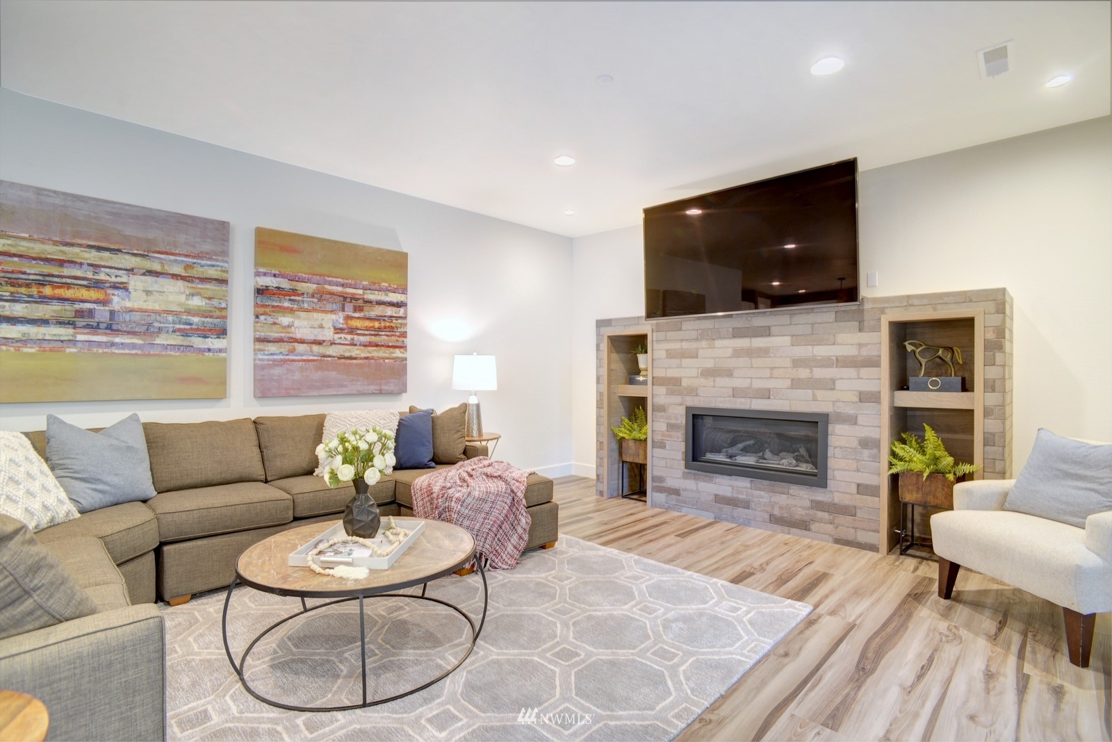 17720 190th Avenue Southeast Renton, WA 98058 - Photo 22 of 40 a living room with furniture and a flat screen tv