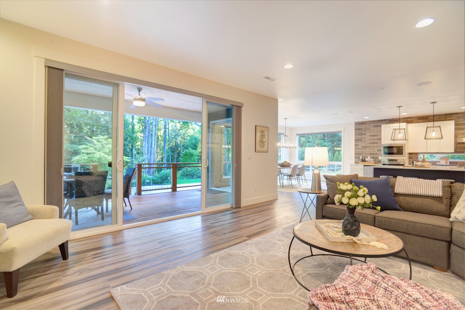 17720 190th Avenue Southeast Renton, WA 98058 - Photo 23 of 40 a living room with furniture and a wooden floor