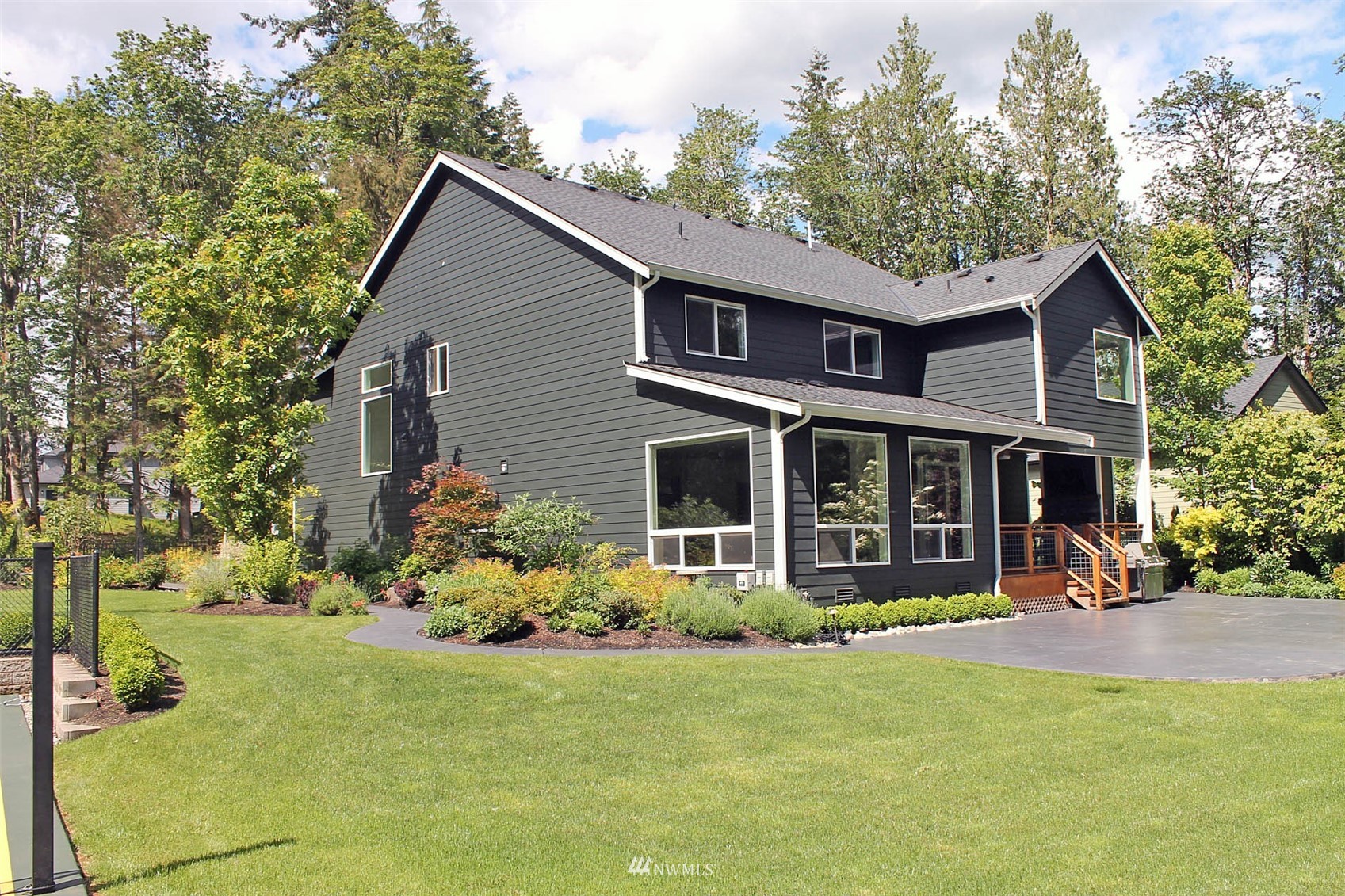 17720 190th Avenue Southeast Renton, WA 98058 - Photo 28 of 40 a front view of a house with garden