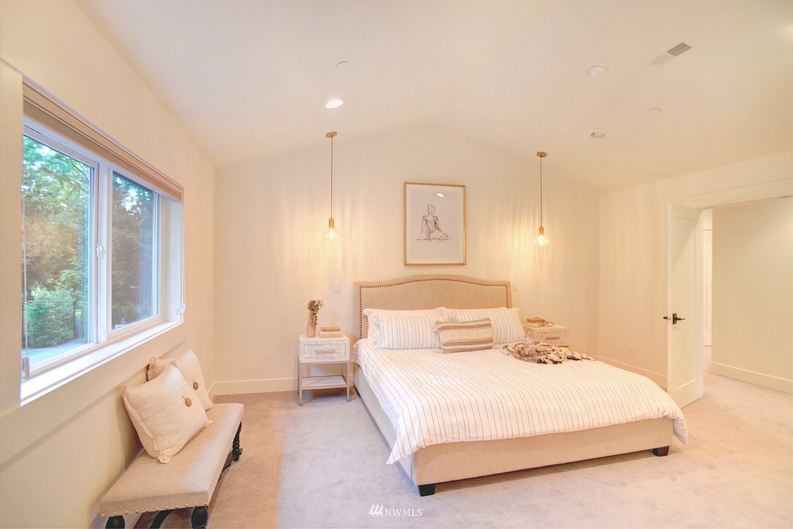 17720 190th Avenue Southeast Renton, WA 98058 - Photo 9 of 40 a bedroom with a large bed and a large window