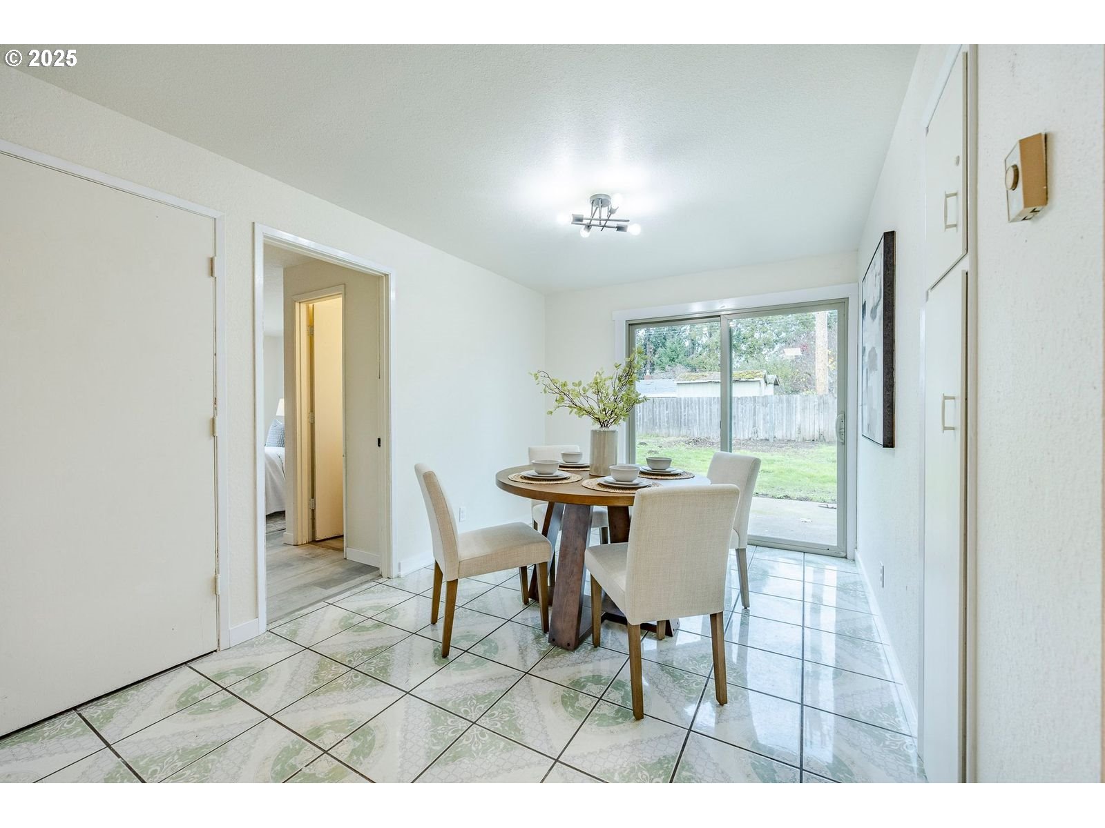 5982 G Street Springfield, OR 97478 - Photo 15 of 39 a dining room with furniture and window