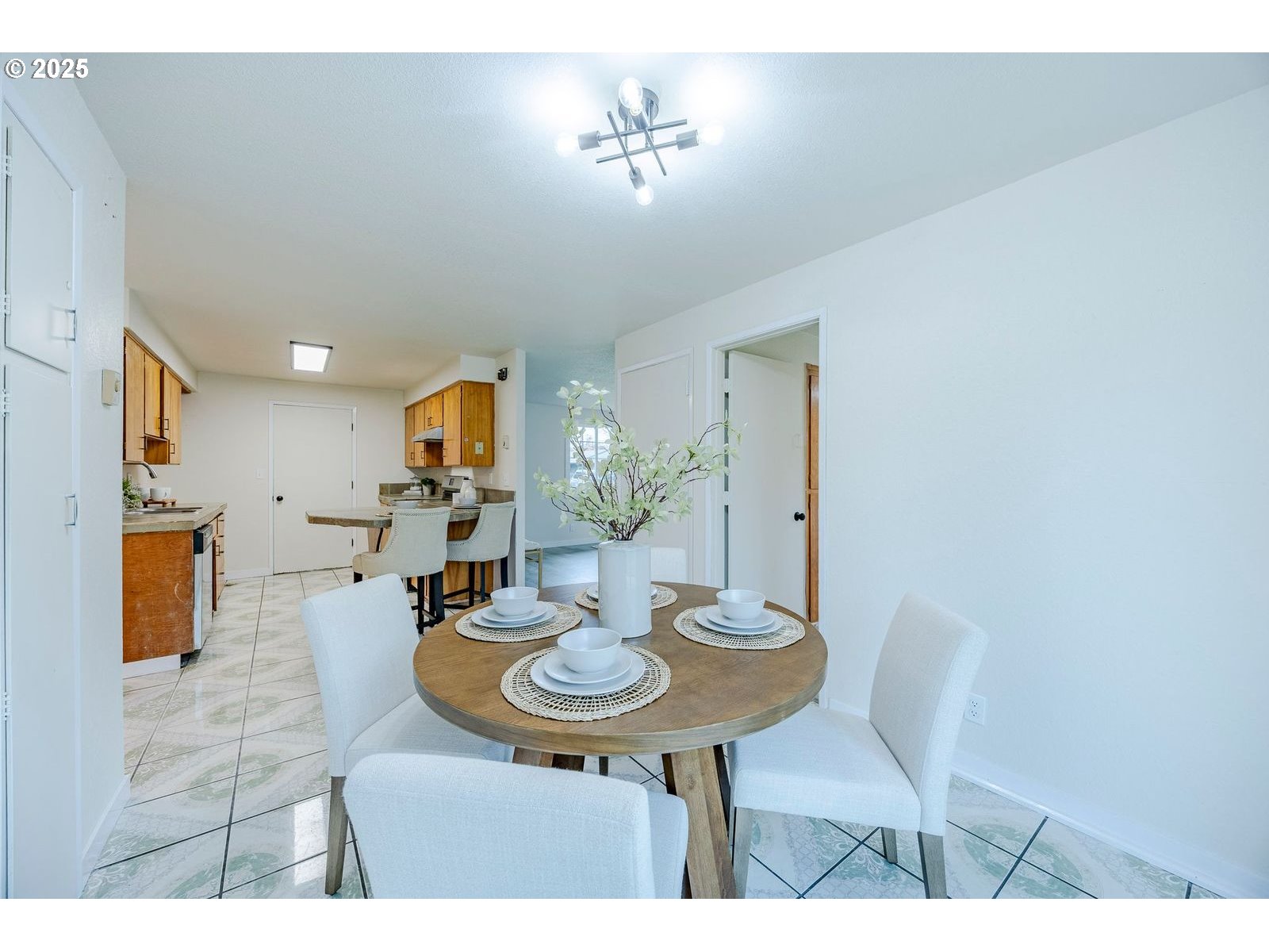 5982 G Street Springfield, OR 97478 - Photo 19 of 39 a view of a dining room with furniture and wooden floor