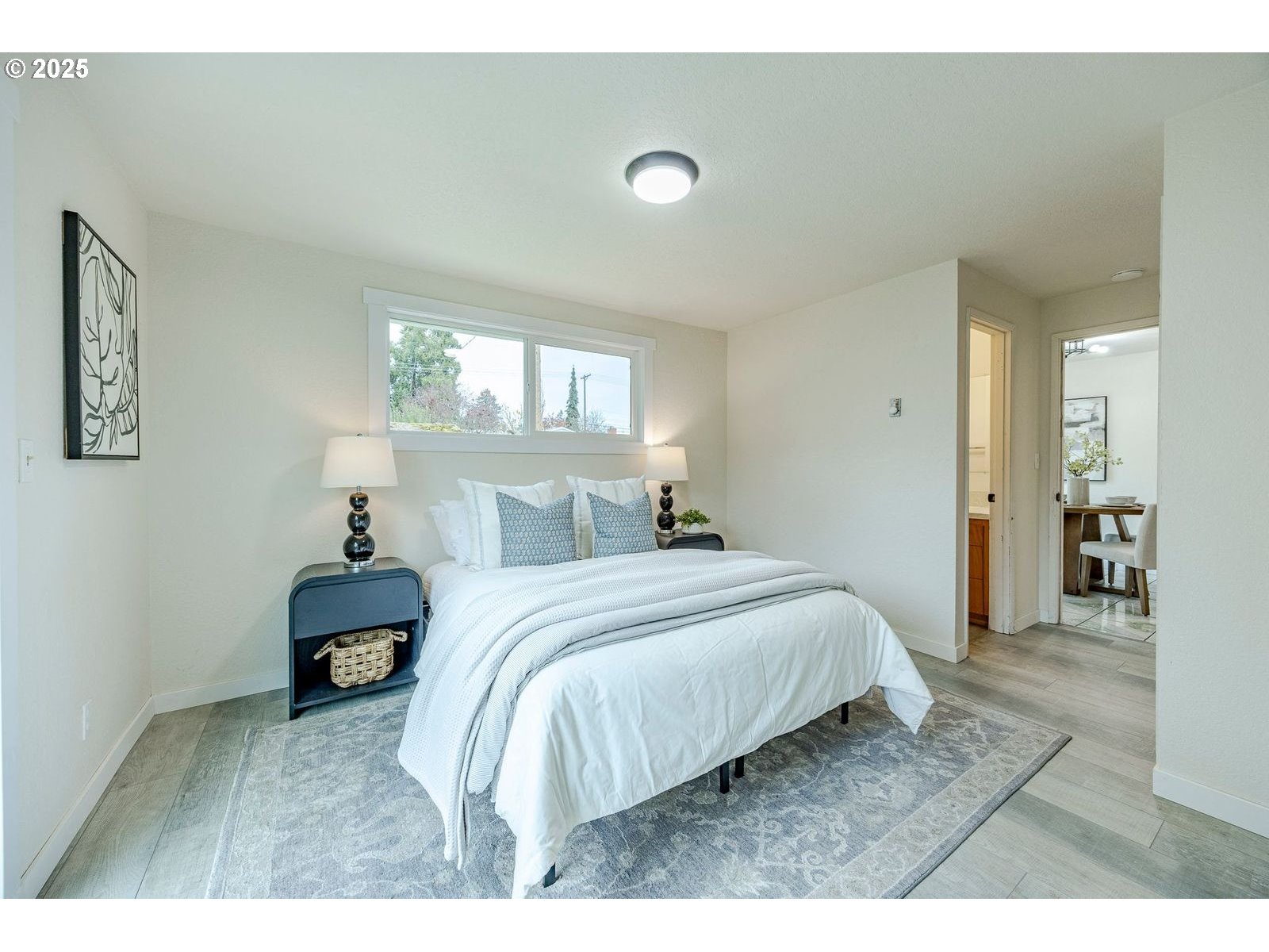 5982 G Street Springfield, OR 97478 - Photo 21 of 39 a bedroom with a bed and a large mirror