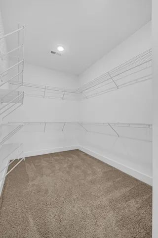 an empty room with windows and window