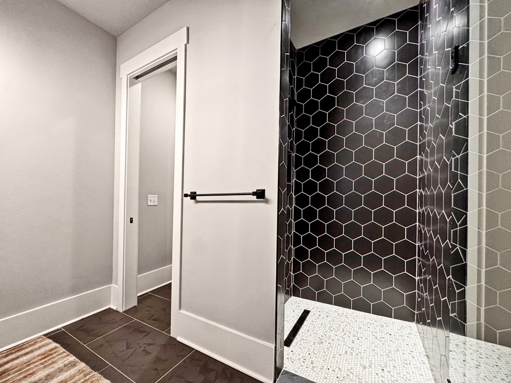 658 Old Toccoa Loop Mineral Bluff, GA 30559 - Photo 46 of 74 a bathroom with a shower and a mirror