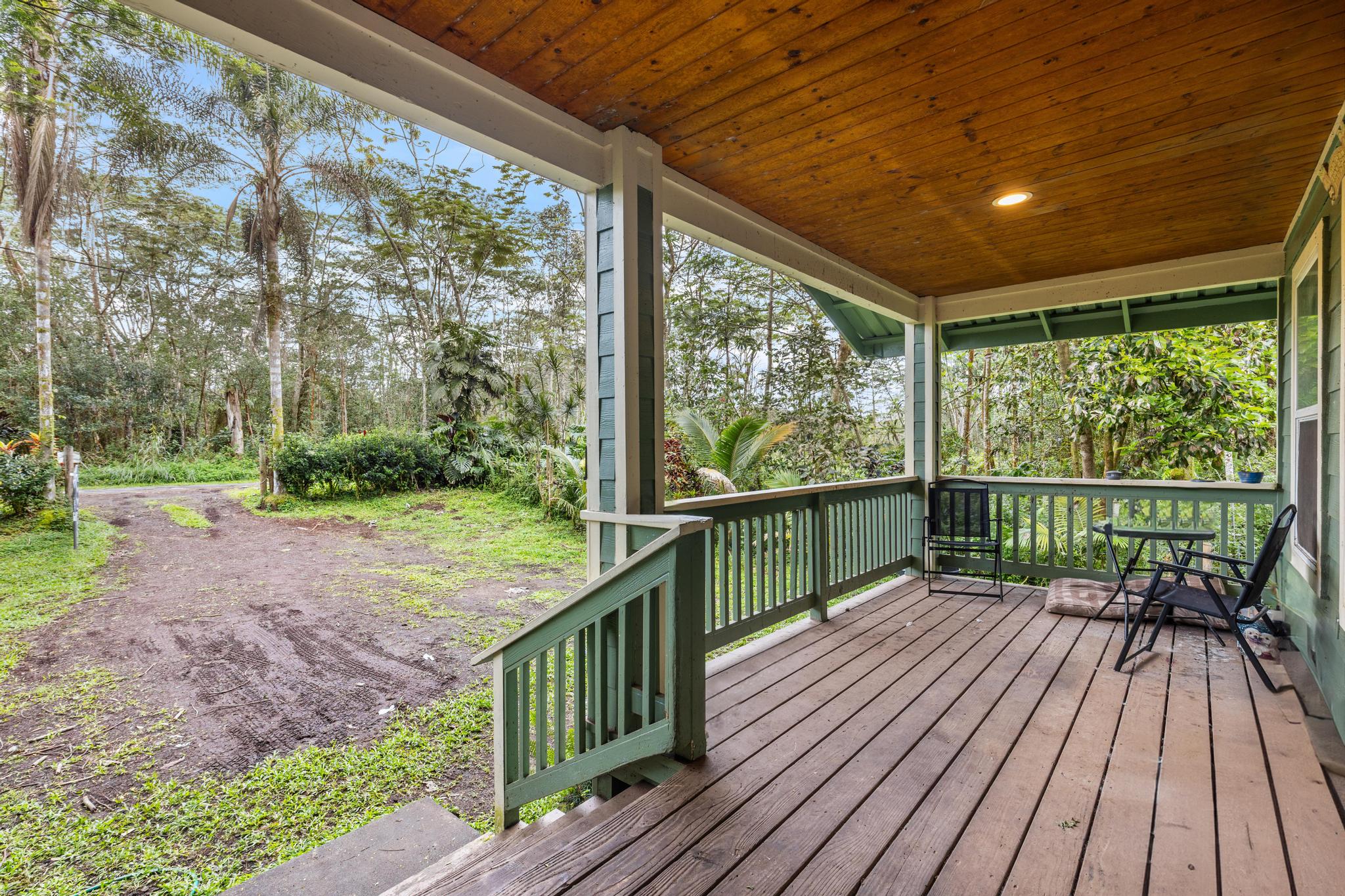 14-823 Seaview Road Pahoa, HI 96778 - Photo 16 of 23 a view of balcony with wooden floor and fence