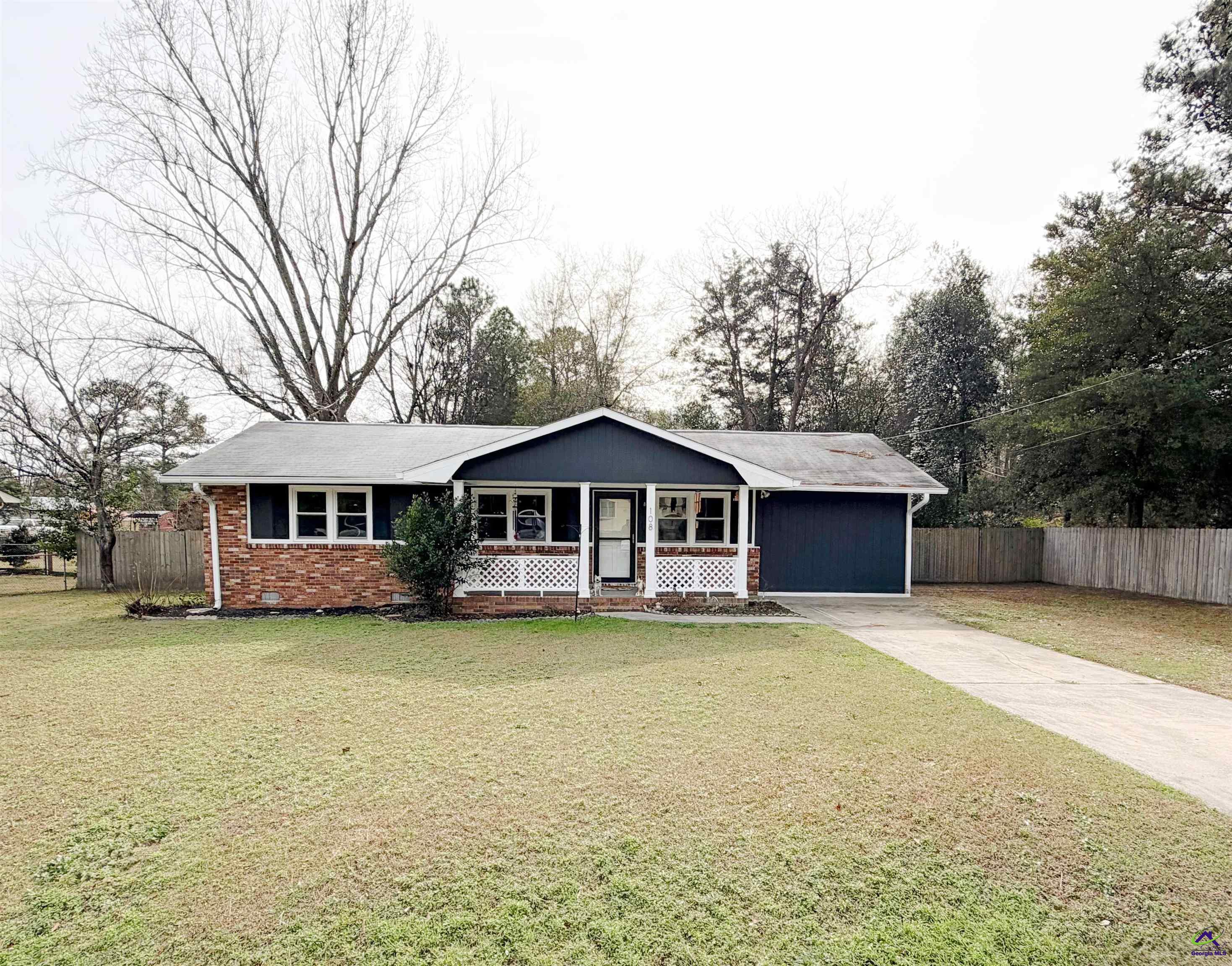 108 Weaver Road Warner Robins, GA 31093 - Photo 2 of 26 a front view of a house with a yard