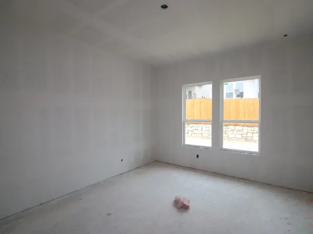 a view of a back yard of the house