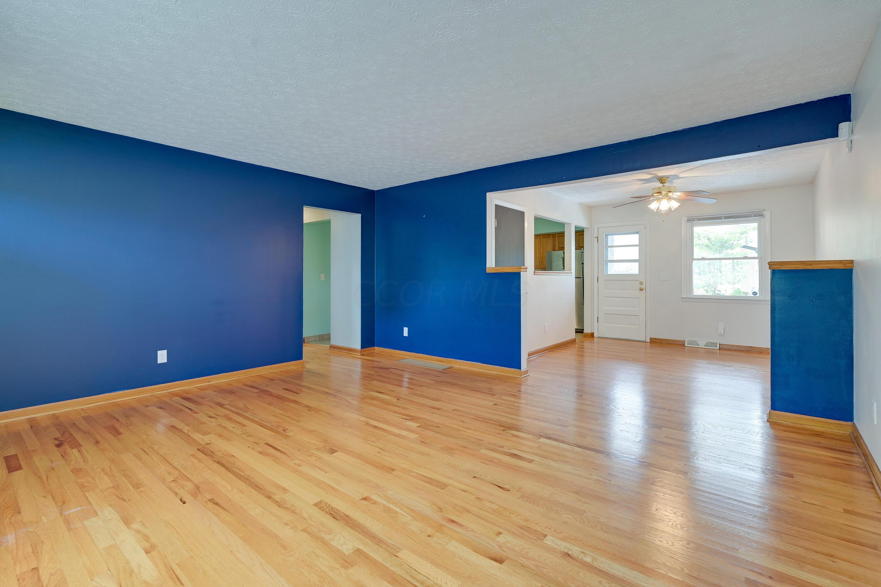 5383 Pine Bluff Road Columbus, OH 43229 - Photo 7 of 32 Living Room with beautiful hardwood floors