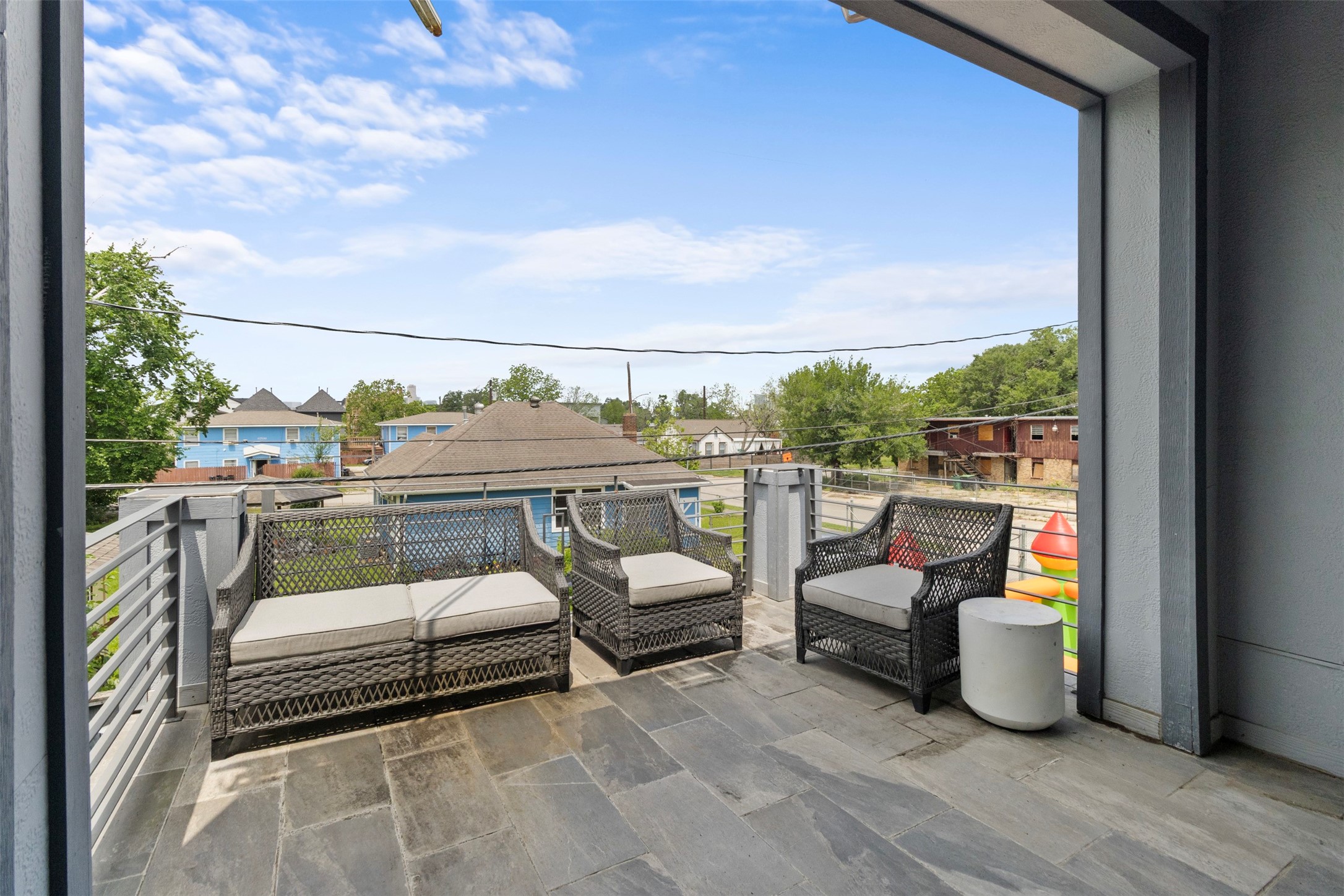 6706 Lozier Street Houston, TX 77021 - Photo 6 of 32 a balcony with furniture and city view