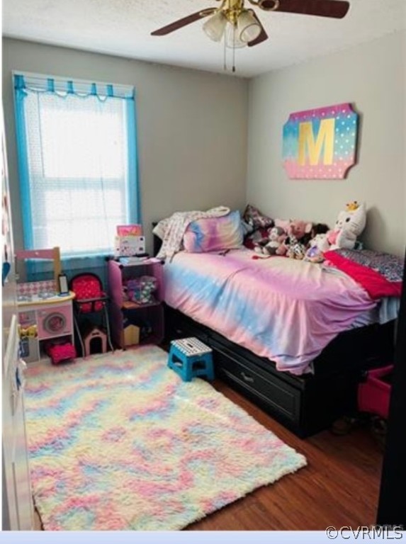 1400 Bangle Drive Richmond, VA 23224 - Photo 7 of 8 a bed room with a bed and a fish tank