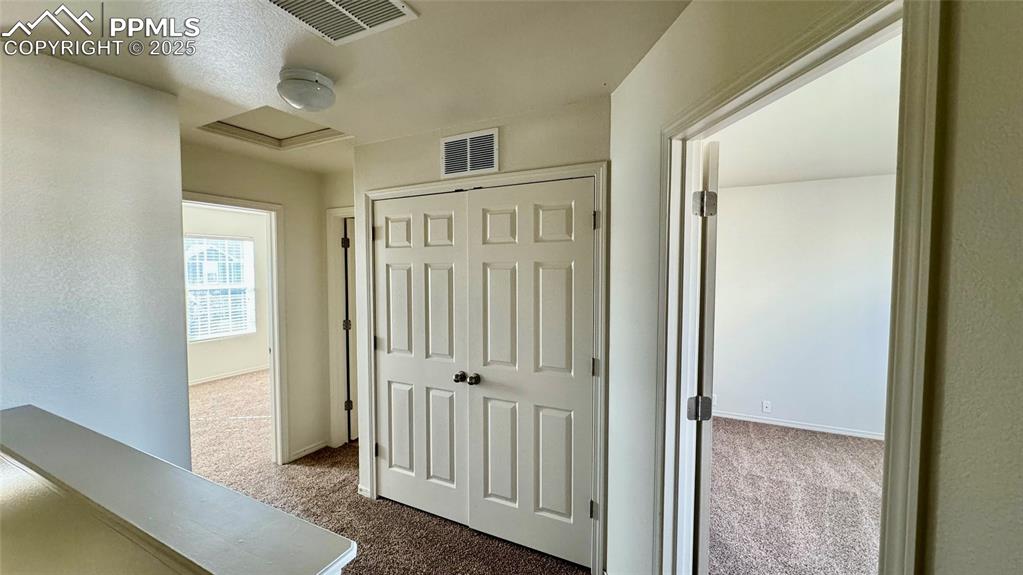 7354 Countryside Grove Fountain, CO 80817 - Photo 15 of 28 a view of a hallway with entryway door