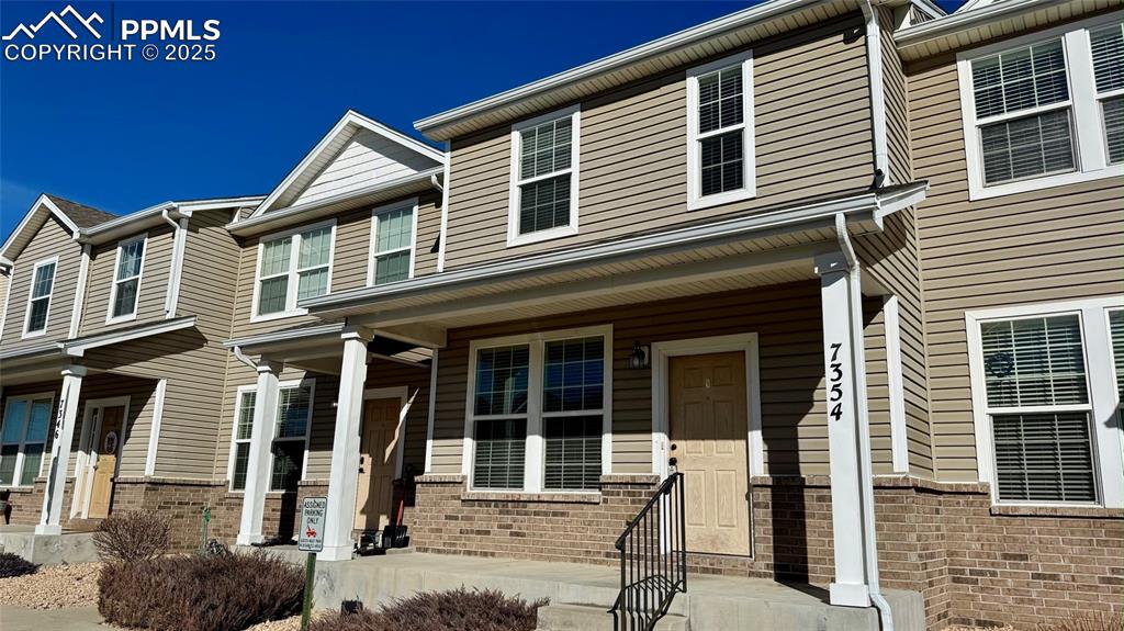 7354 Countryside Grove Fountain, CO 80817 - Photo 2 of 28 a front view of a house with glass windows