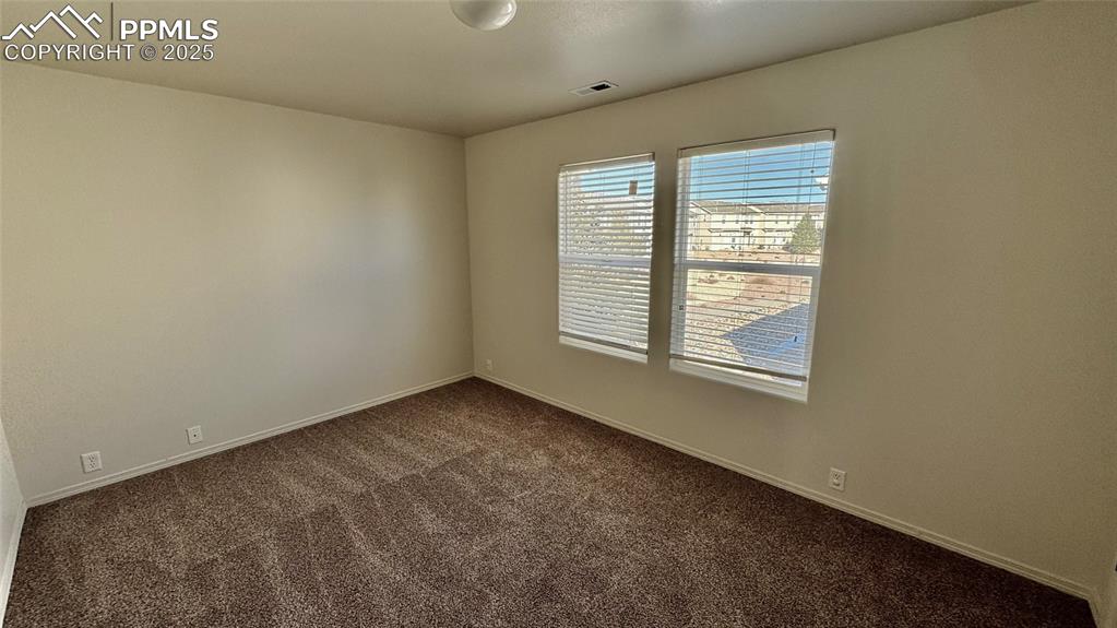 7354 Countryside Grove Fountain, CO 80817 - Photo 22 of 28 a view of an empty room with a window