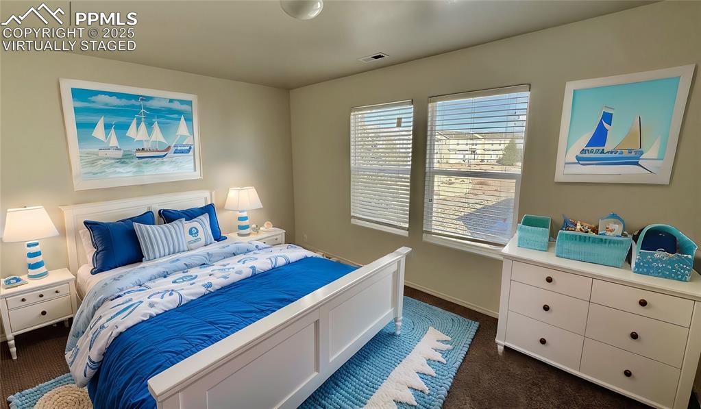 7354 Countryside Grove Fountain, CO 80817 - Photo 23 of 28 a bed room with a bed and a window