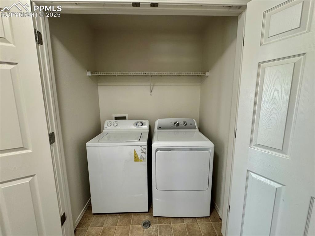 7354 Countryside Grove Fountain, CO 80817 - Photo 24 of 28 a utility room with dryer and washer