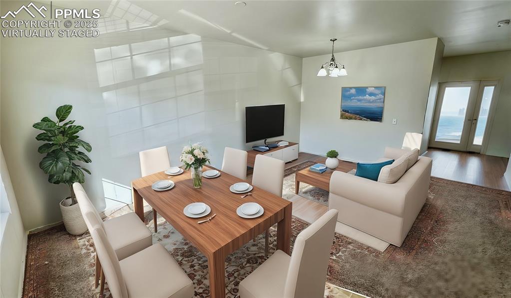 7354 Countryside Grove Fountain, CO 80817 - Photo 7 of 28 a view of a dining room with furniture and a potted plant