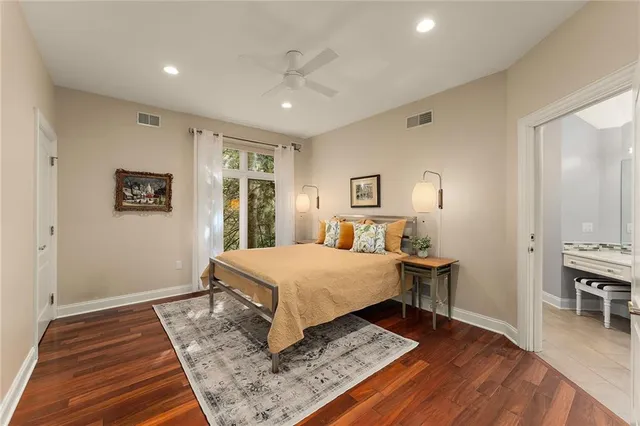a living room with a rug and a table