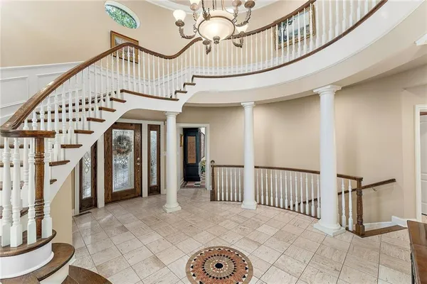 a view of entryway with a front door