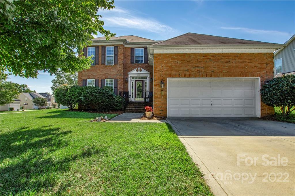 5511 Alexandrite Way Fort Mill, SC 29708 - Photo 1 of 32 a front view of a house with a yard