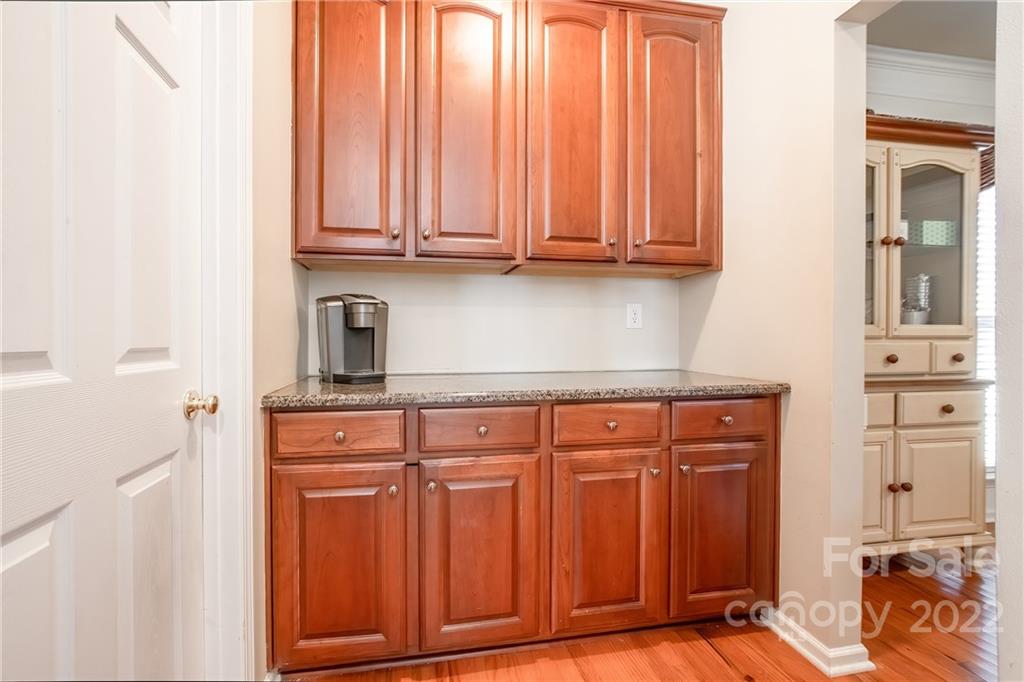 5511 Alexandrite Way Fort Mill, SC 29708 - Photo 13 of 32 a view of a refrigerator and cabinets