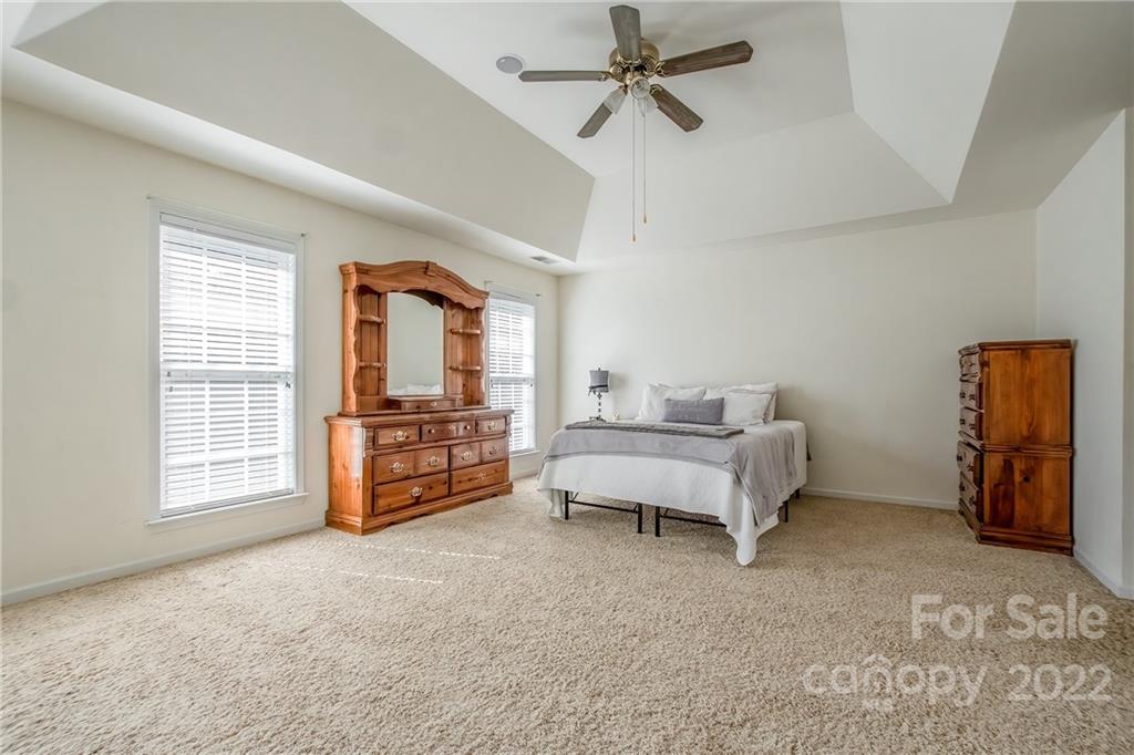 5511 Alexandrite Way Fort Mill, SC 29708 - Photo 14 of 32 a spacious bedroom with a bed and a window