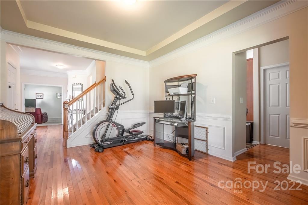 5511 Alexandrite Way Fort Mill, SC 29708 - Photo 24 of 32 a view of a livingroom with wooden floor and furniture