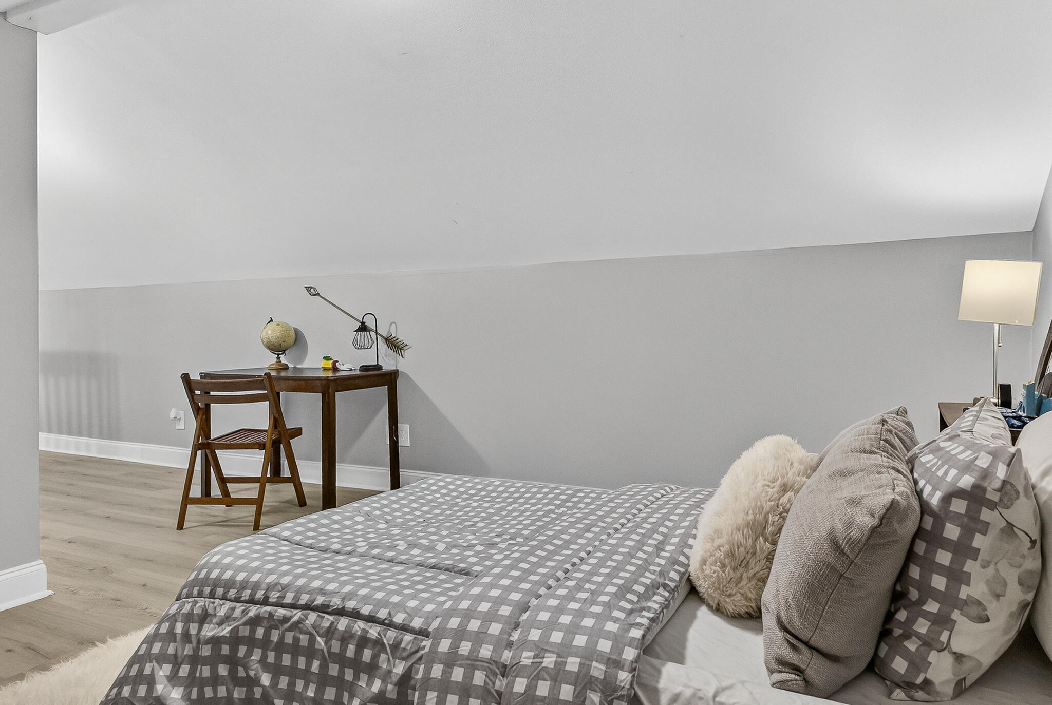 115 Central 6th Street Santa Rosa Beach, FL 32459 - Photo 33 of 56 a bedroom with a bed and a lamp on table