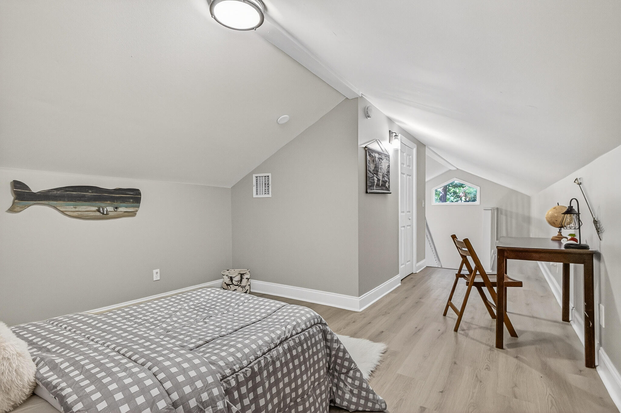 115 Central 6th Street Santa Rosa Beach, FL 32459 - Photo 34 of 56 a bedroom with a bed and a table in it