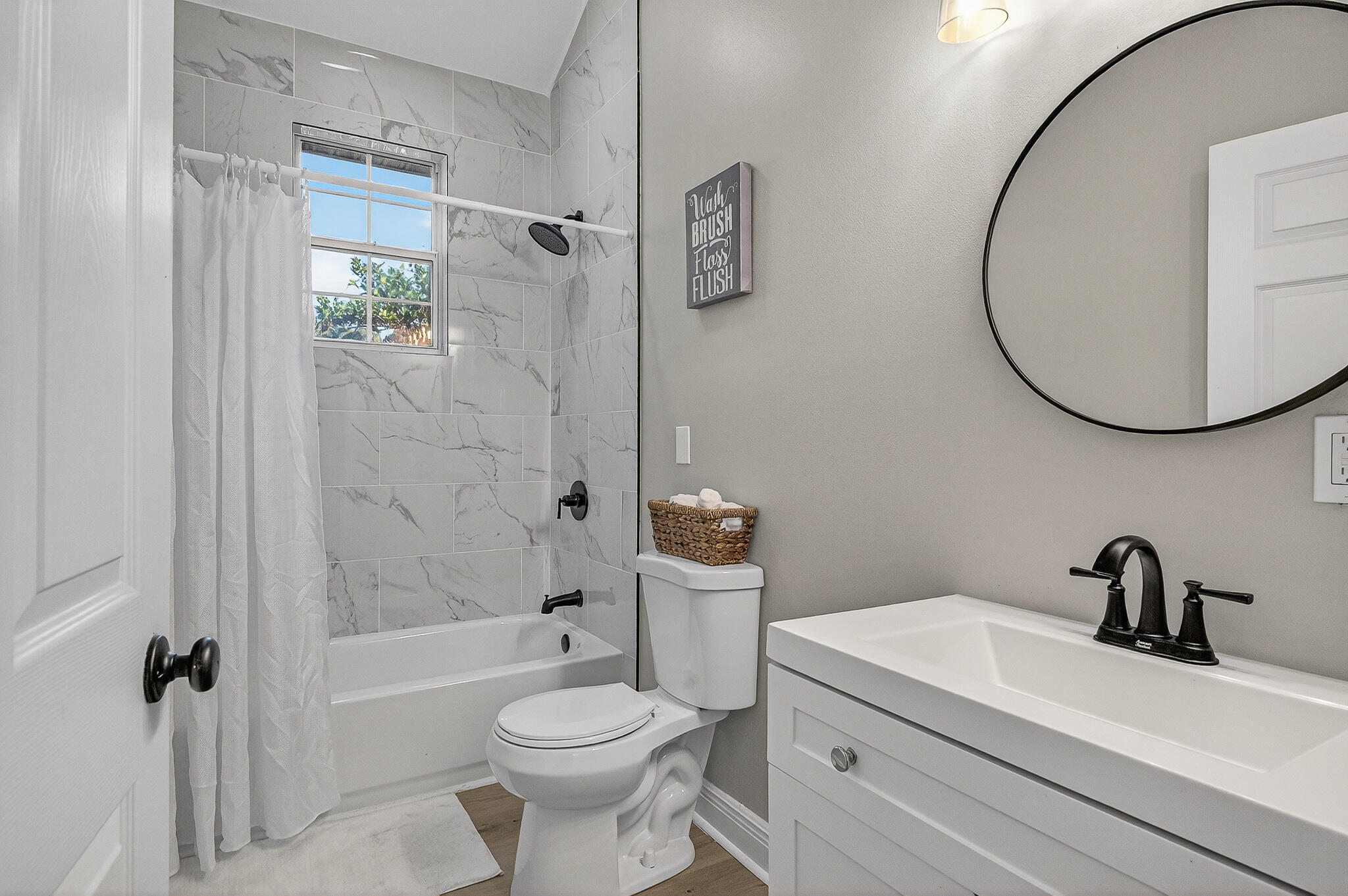 115 Central 6th Street Santa Rosa Beach, FL 32459 - Photo 40 of 56 a bathroom with a sink a toilet and shower