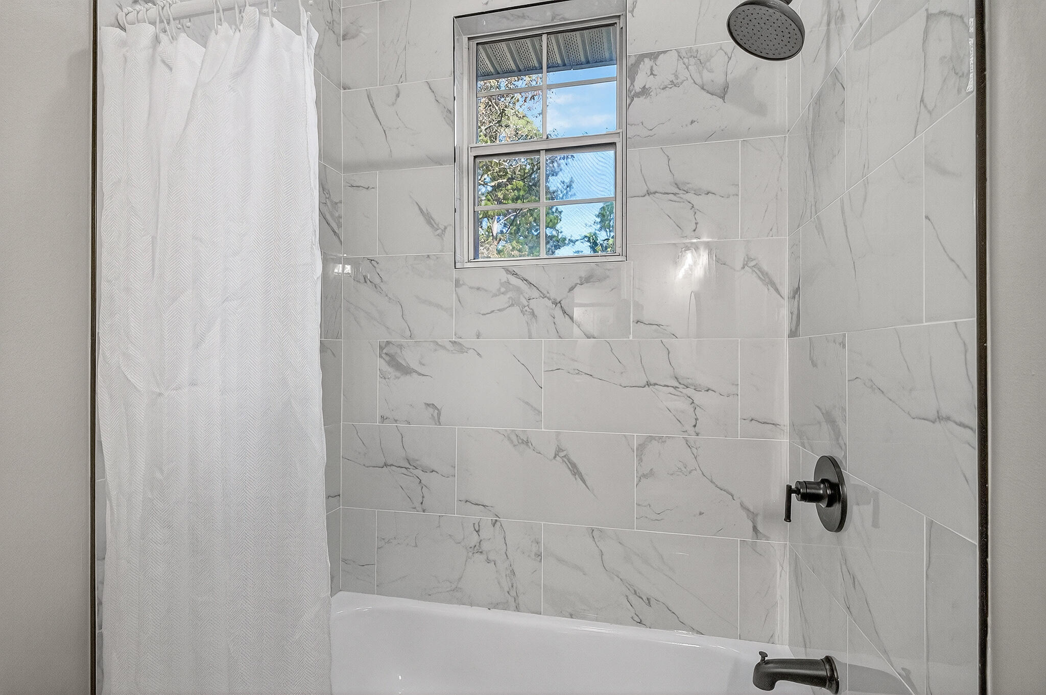 115 Central 6th Street Santa Rosa Beach, FL 32459 - Photo 41 of 56 a bathroom with a shower