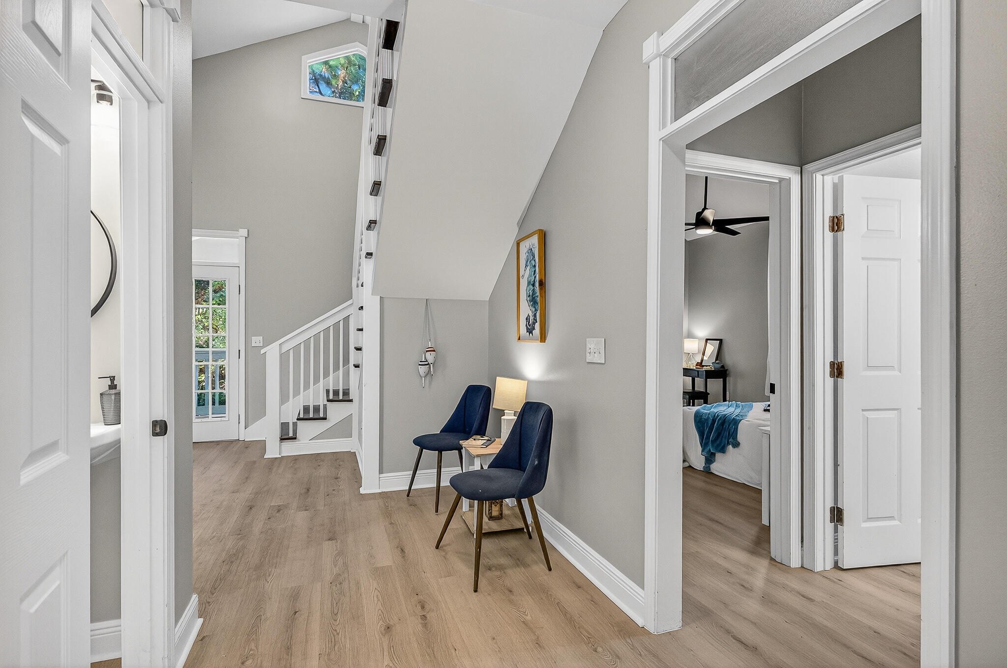 115 Central 6th Street Santa Rosa Beach, FL 32459 - Photo 43 of 56 a living room with furniture and a wooden floor