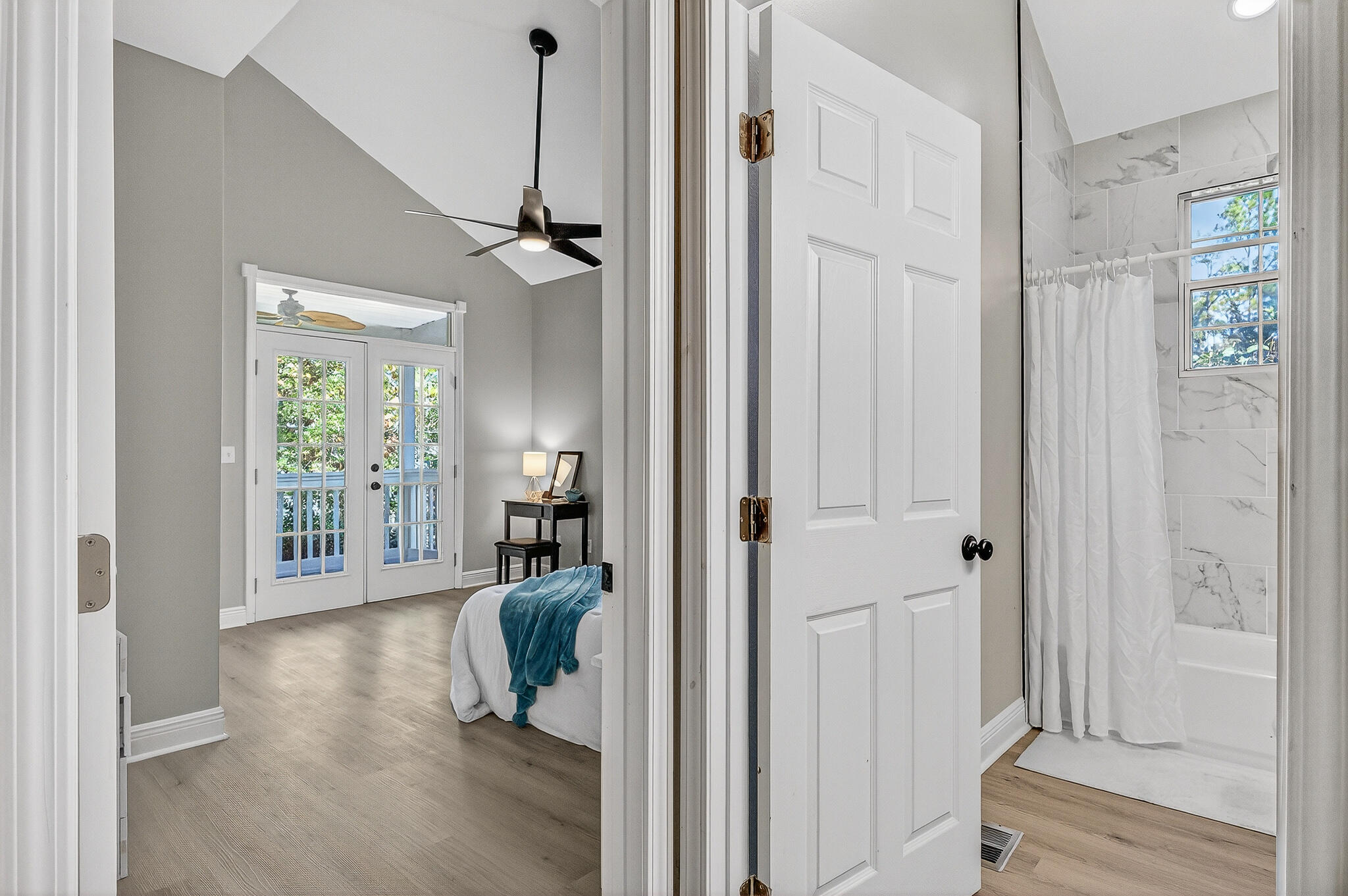 115 Central 6th Street Santa Rosa Beach, FL 32459 - Photo 44 of 56 a view of a livingroom with a hardwood floor and a hallway