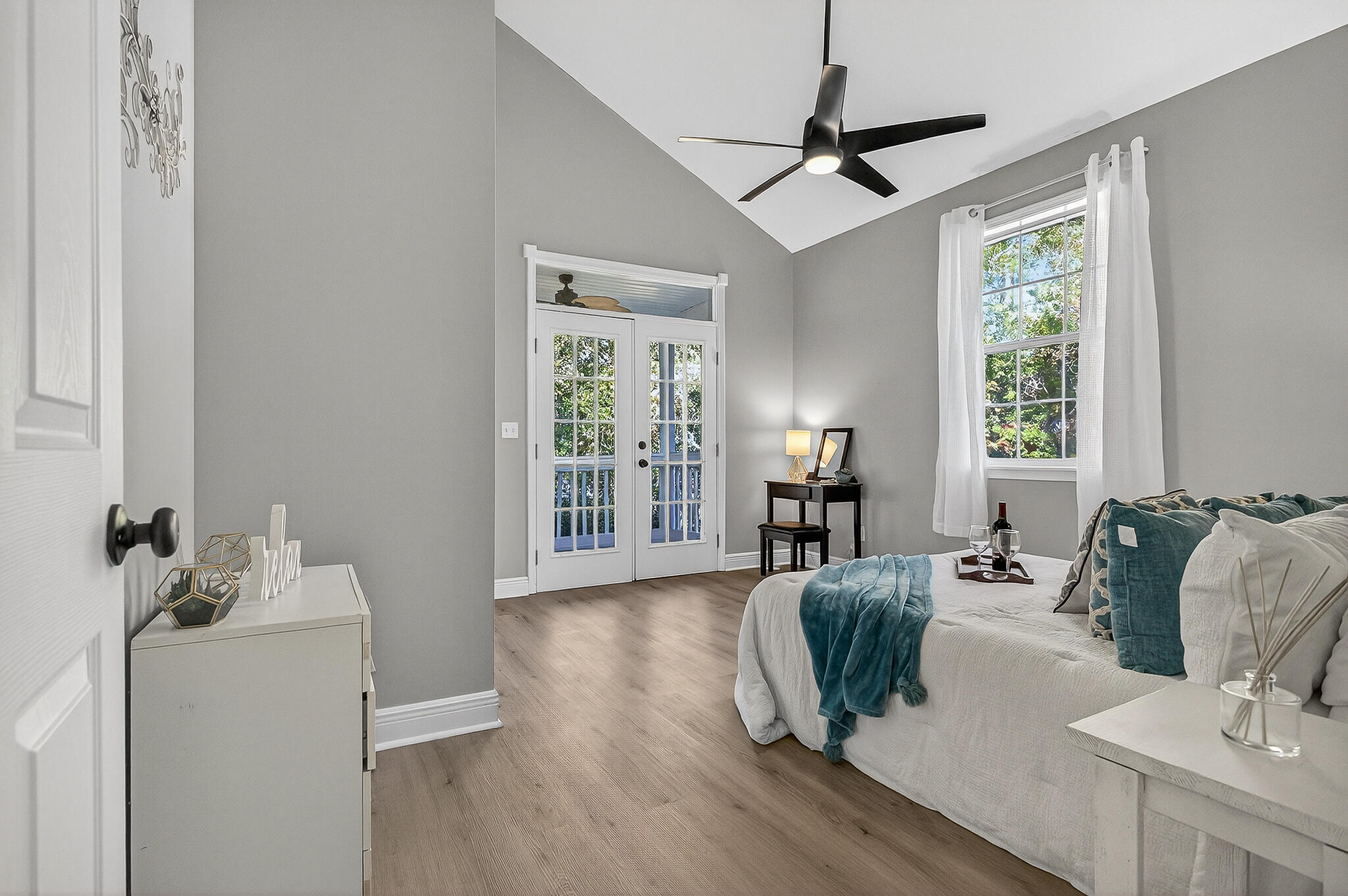 115 Central 6th Street Santa Rosa Beach, FL 32459 - Photo 45 of 56 a living room with furniture two window and wooden floor