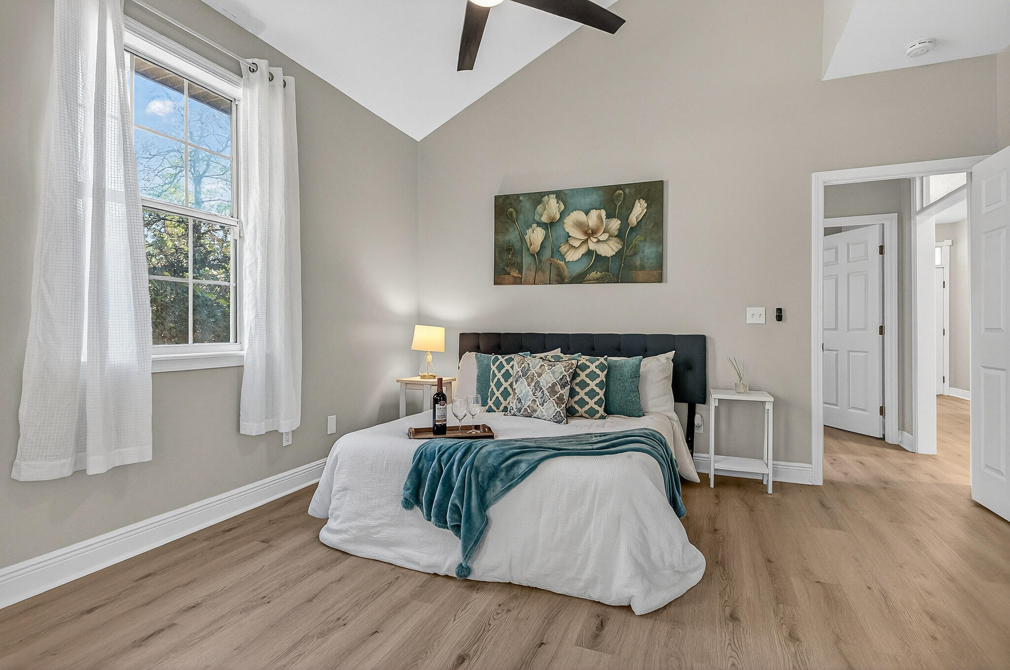 115 Central 6th Street Santa Rosa Beach, FL 32459 - Photo 47 of 56 a bedroom with a large bed and a window