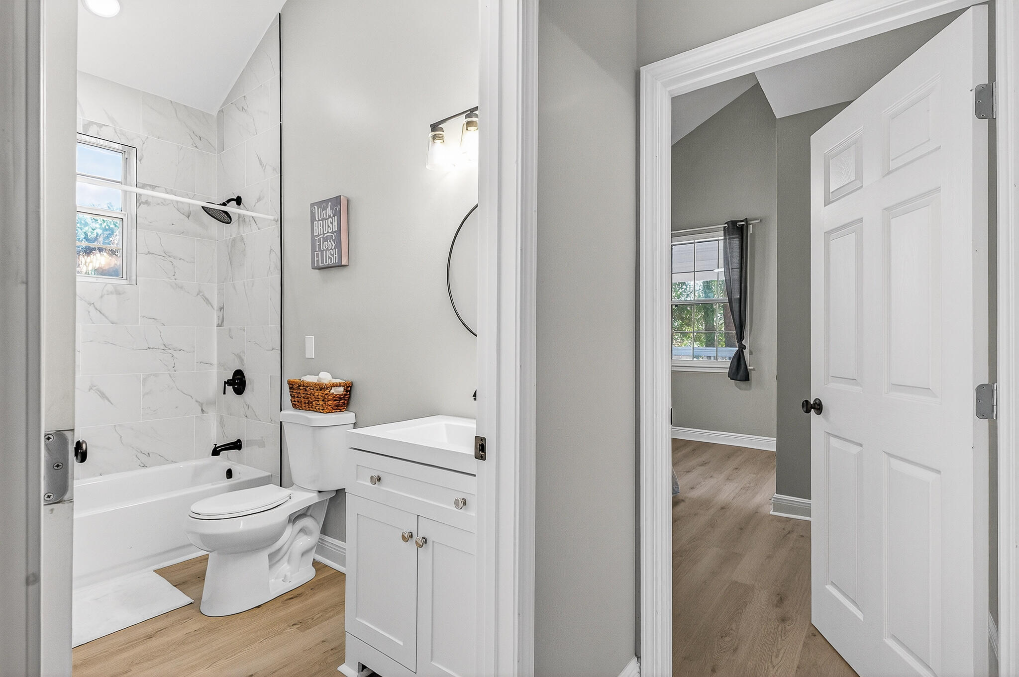 115 Central 6th Street Santa Rosa Beach, FL 32459 - Photo 50 of 56 a bathroom with a toilet and a shower