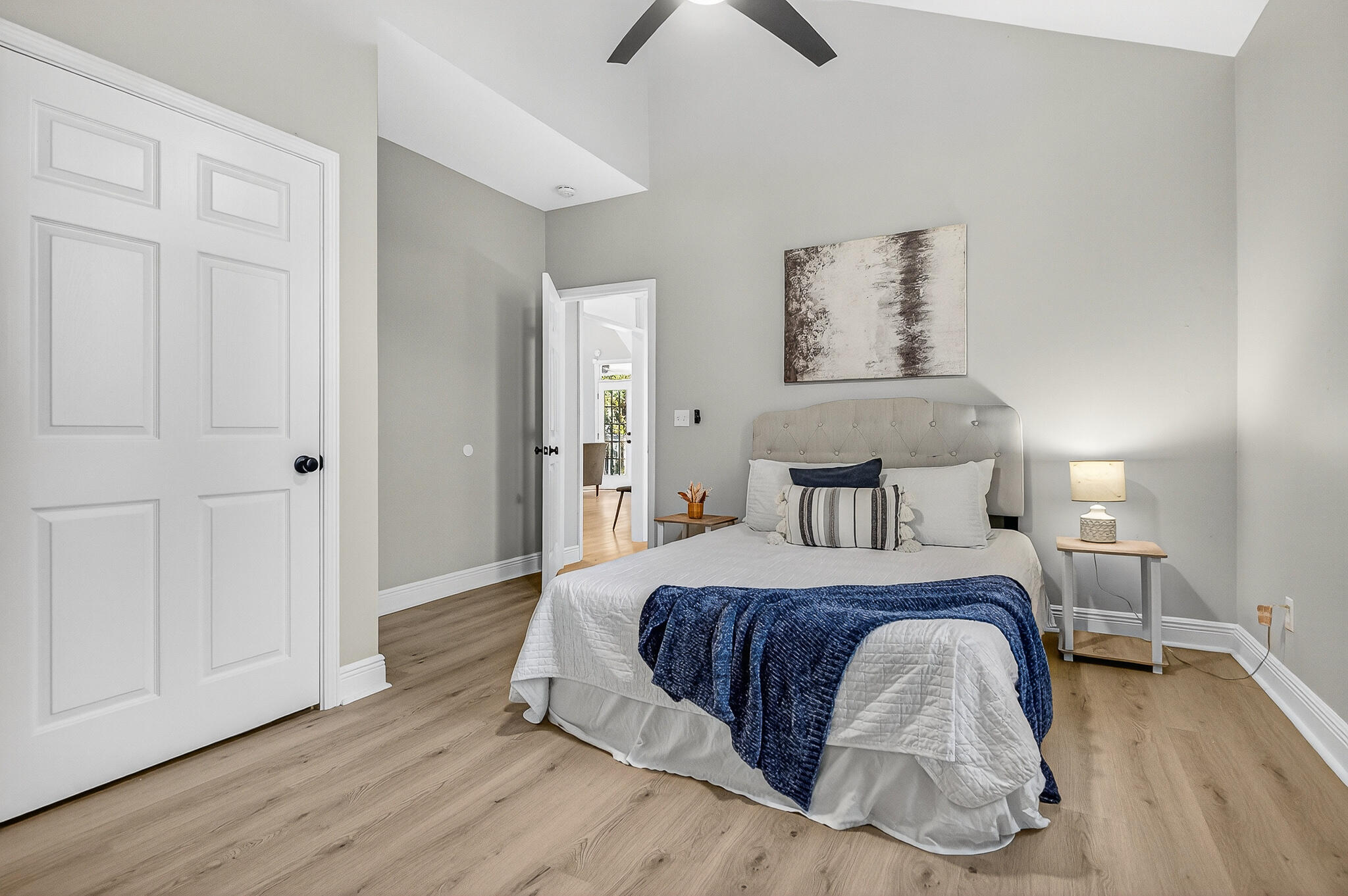 115 Central 6th Street Santa Rosa Beach, FL 32459 - Photo 53 of 56 a bedroom with a bed and wooden floor