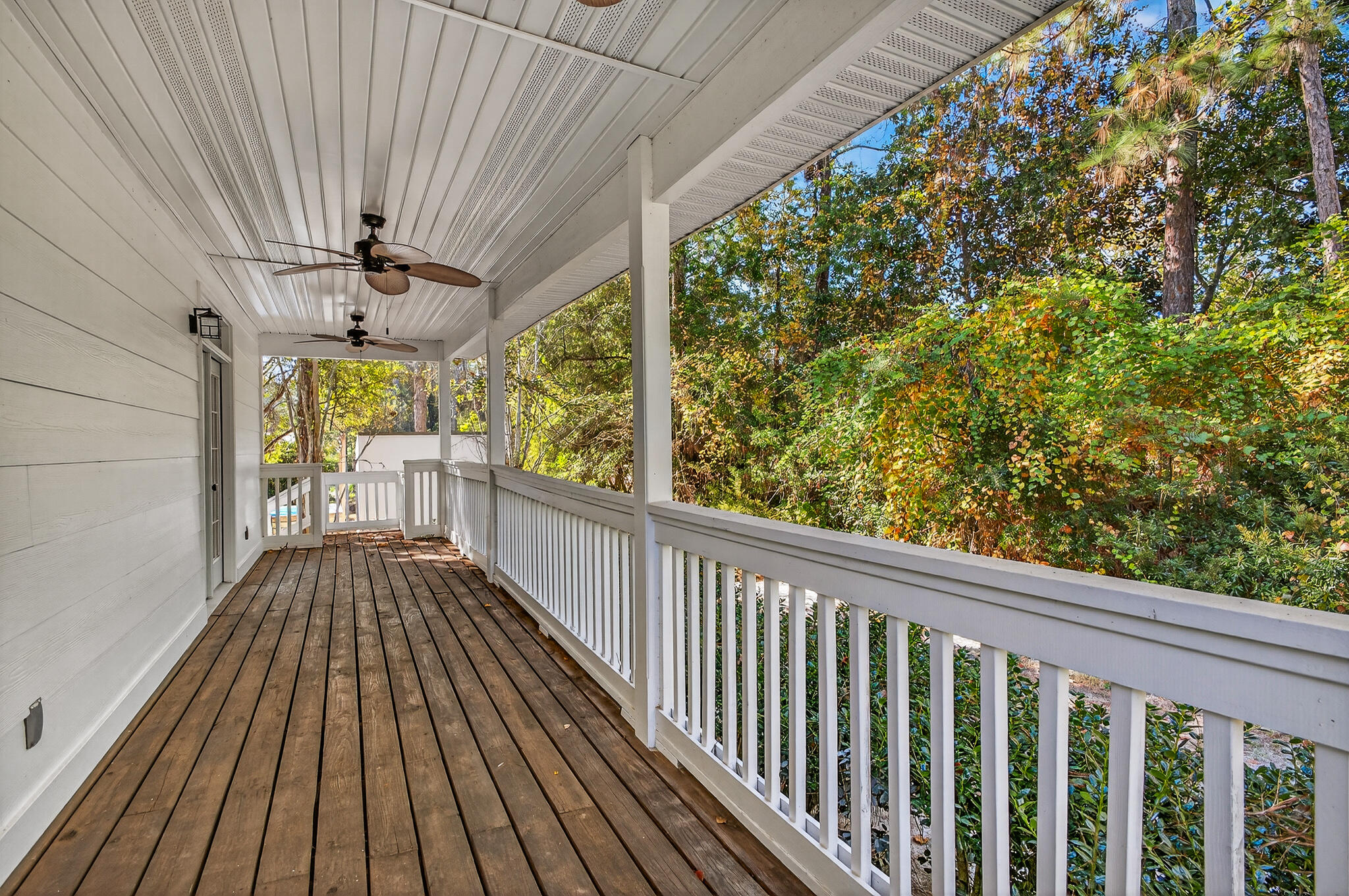 115 Central 6th Street Santa Rosa Beach, FL 32459 - Photo 55 of 56 a view of a balcony with wooden floor
