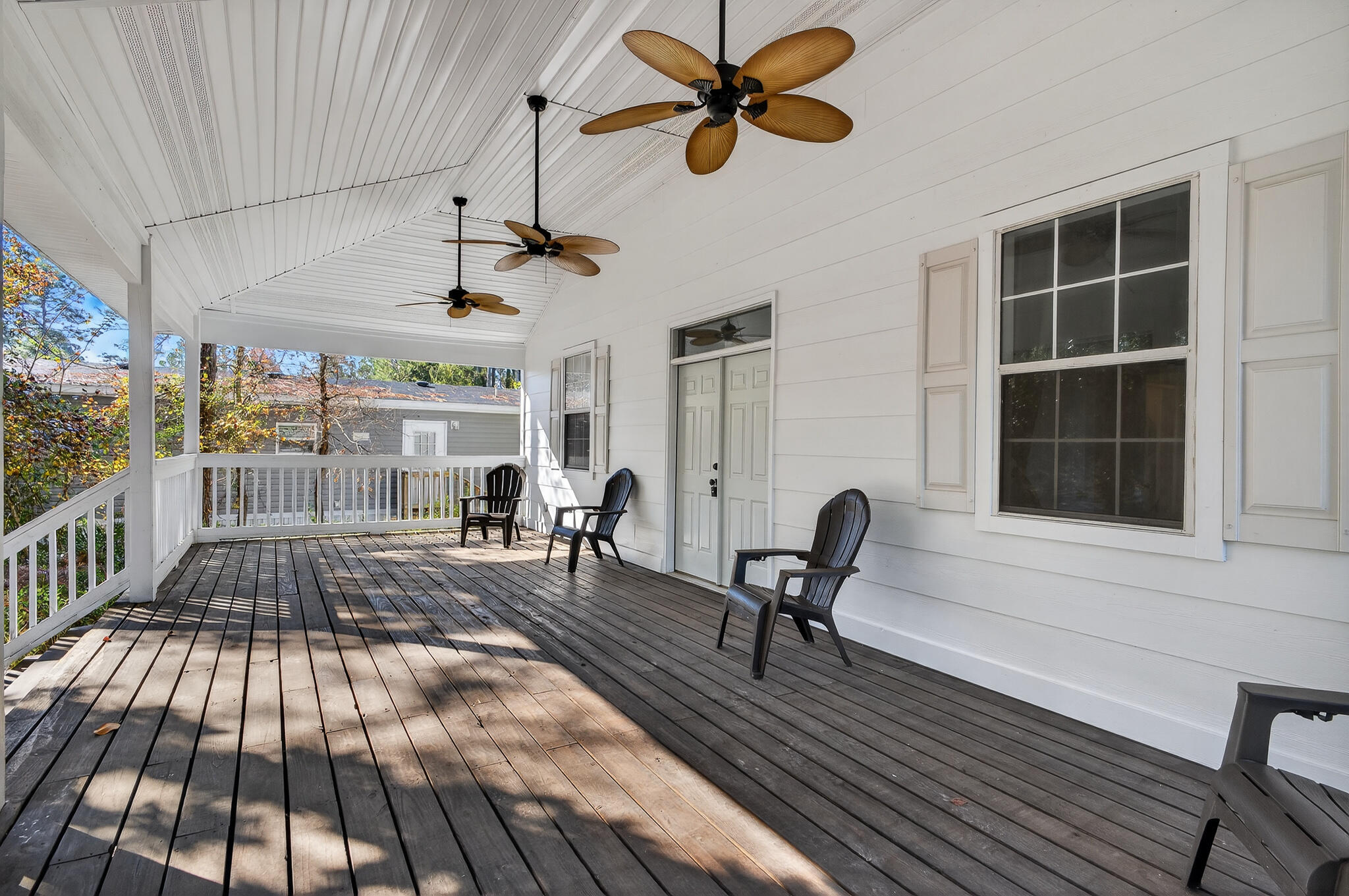 115 Central 6th Street Santa Rosa Beach, FL 32459 - Photo 6 of 56 a view of a dining room with furniture window and wooden floor