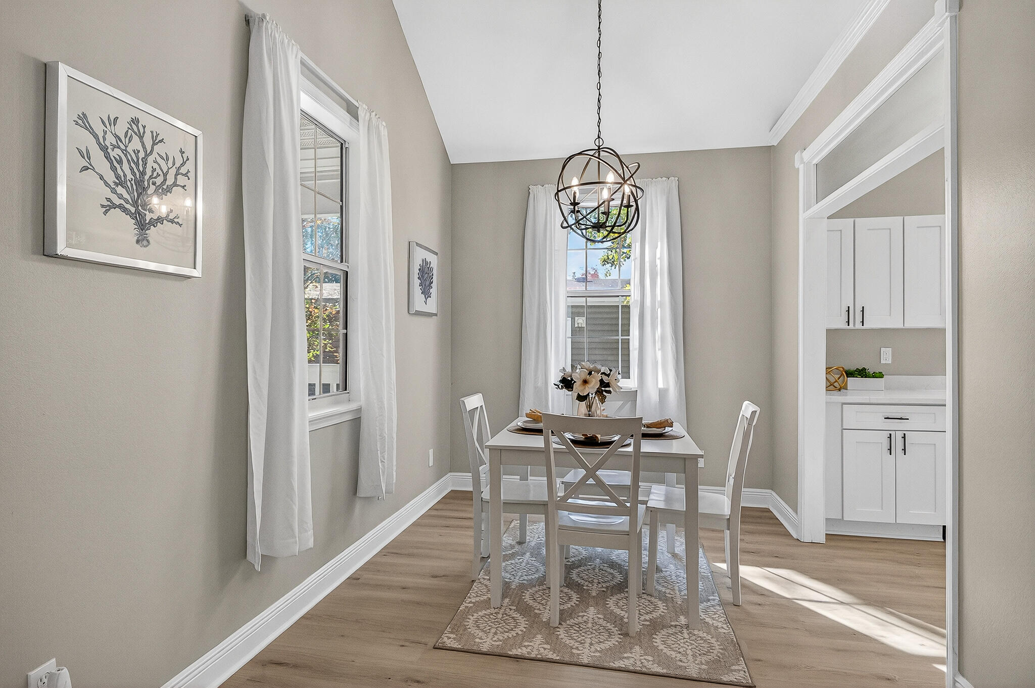 115 Central 6th Street Santa Rosa Beach, FL 32459 - Photo 9 of 56 a view of a dining room with furniture window and wooden floor