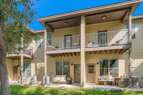 a building outdoor space with patio furniture