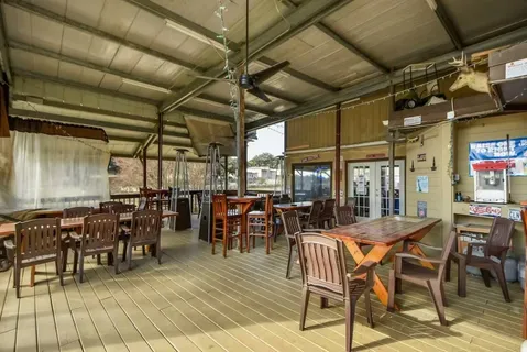 a view of a swimming pool with an outdoor space