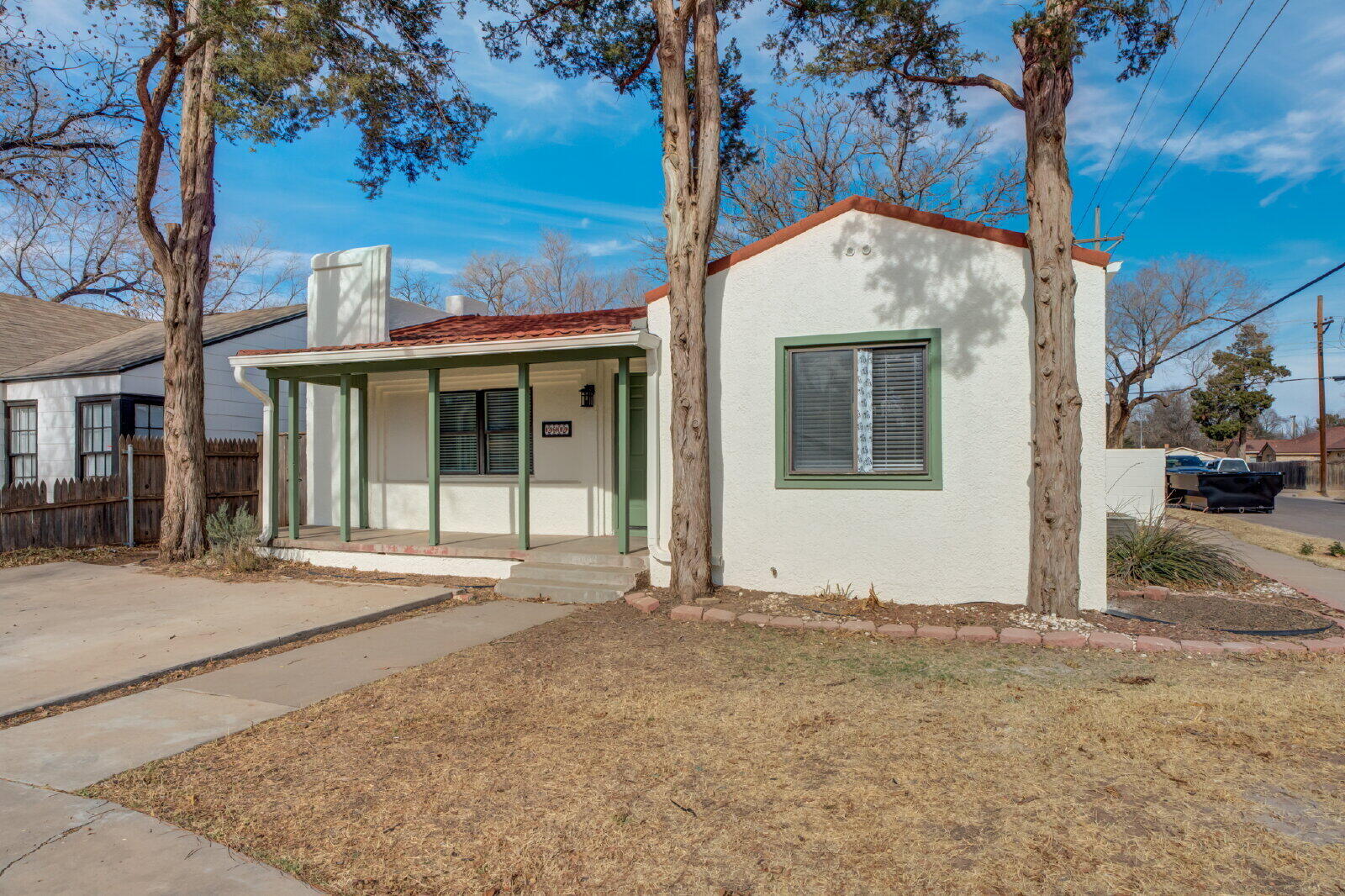 2602 24th Street Lubbock, TX 79410 - Photo 2 of 37 a view of a house with a tree in front of it