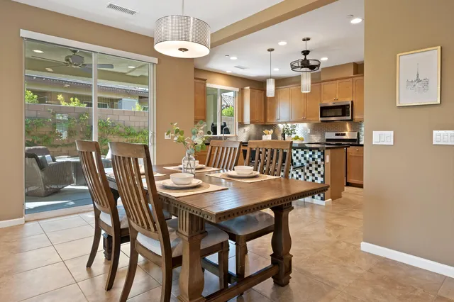 a kitchen with kitchen island granite countertop a sink and counter space