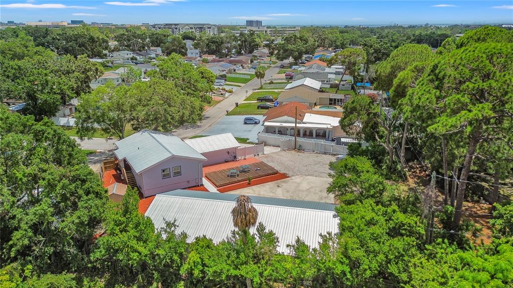 6515 Dimarco Road Tampa, FL 33634 - Photo 66 of 66 an aerial view of a house with outdoor space and street view
