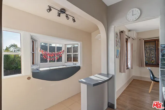 a view of living room kitchen and hardwood