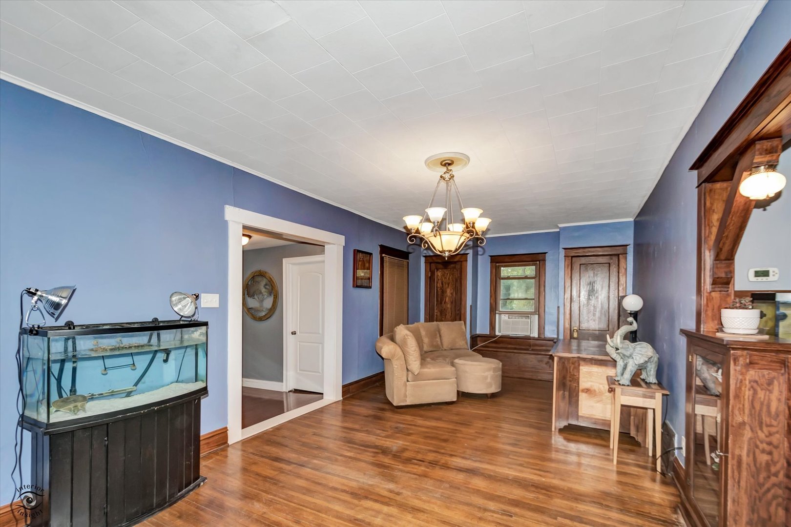 314 Bruce Road Lockport, IL 60441 - Photo 3 of 24 a spacious bedroom with a bed and a chandelier