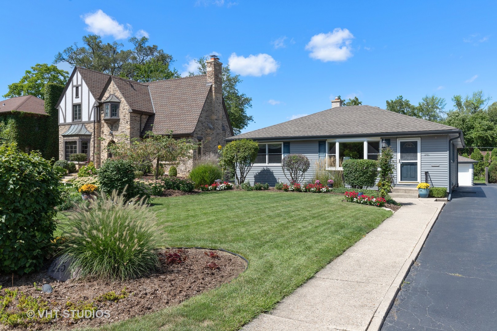 245 East St Charles Road Elmhurst, IL 60126 - Photo 1 of 18 a front view of a house with a yard